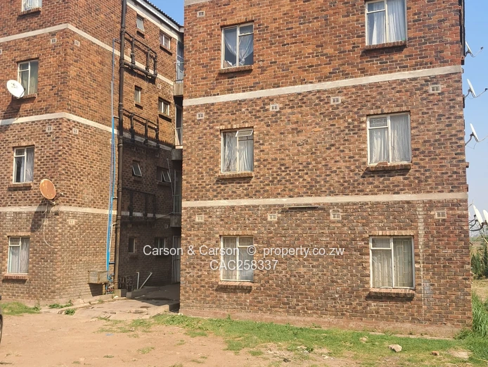 Mufakose 2 bedroom flat lounge fitted kitchen combined toilet and bathroom on ground floor 