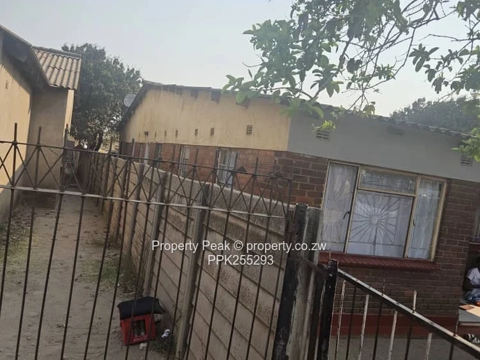 11-Bedroom Brick Home in Mbare — Walled, Main Road Deeds available
