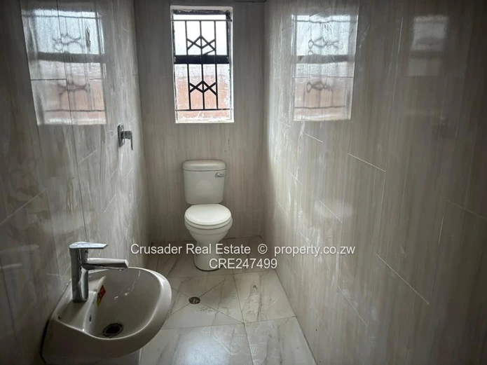 Modern 2-Bed Flat in Tynwald — Borehole & Built-ins (Sole Mandate)