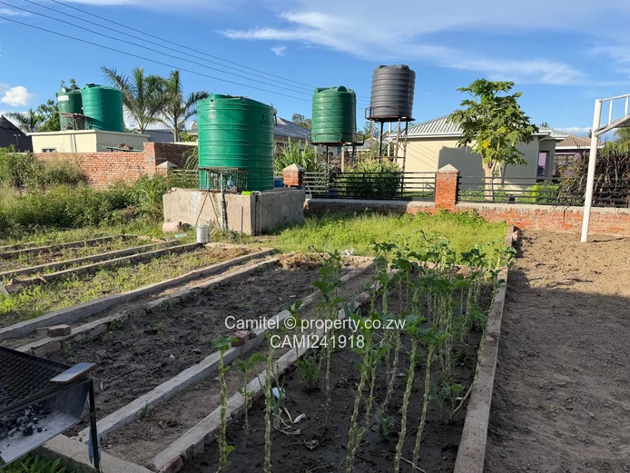 Incomplete 4 Bed double storey with a 3 bed cottage with title deed