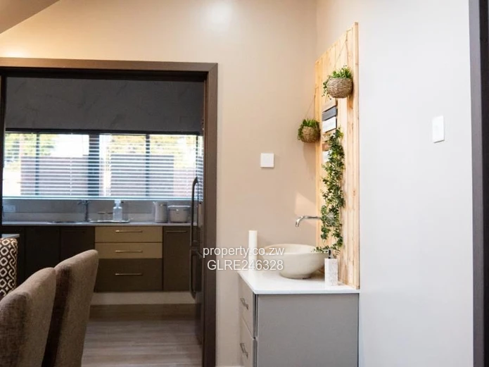 Furnished 3-Bed Modern Home with Balcony & Borehole in Highlands
