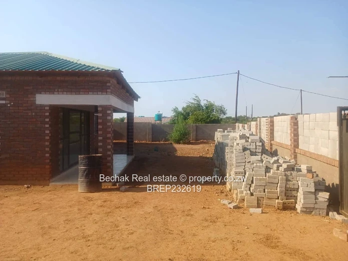 Mahatshula Brick 3-Bed Home — Verandah & Walled Yard