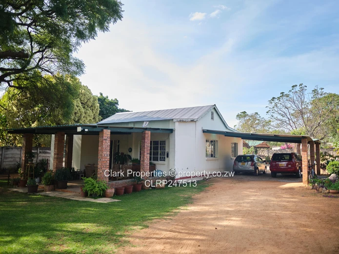 Charming Hillside Home with Undeveloped Land