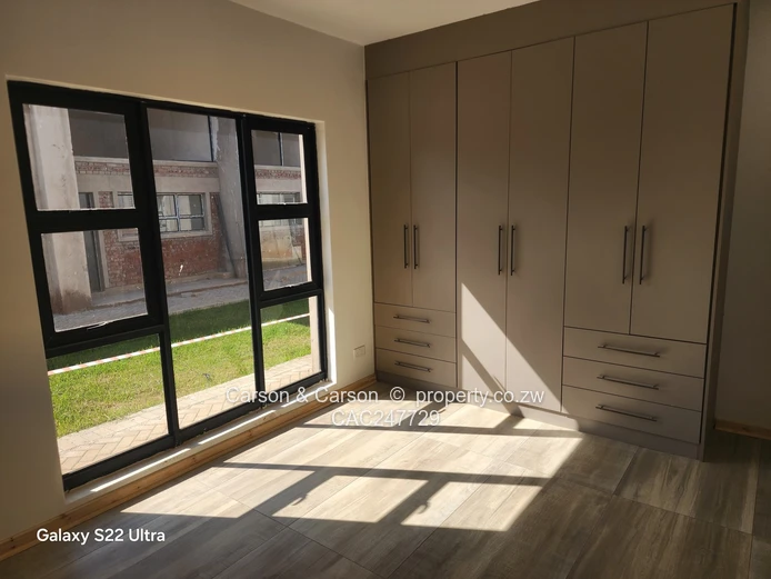 Modern 3-Bed, 2-Bath Garden Flat with Borehole – Borrowdale