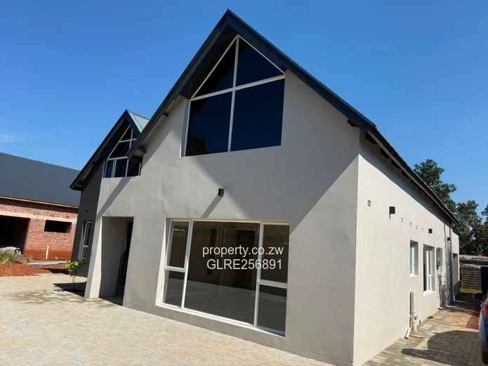 Modern 4-Bed Borrowdale Home — Double-Volume Living, Borehole