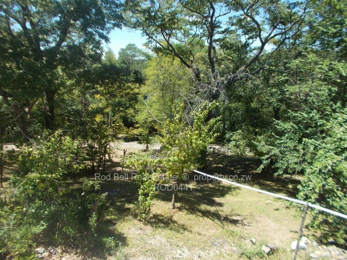 This property offers 2 homes and is set amongst stunning msasa trees