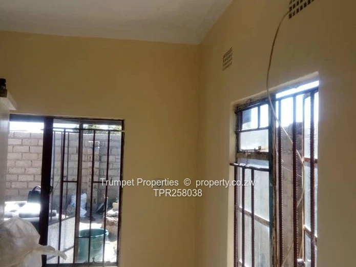 4-Bed Chitungwiza Home — Fitted Kitchen & Barred Windows