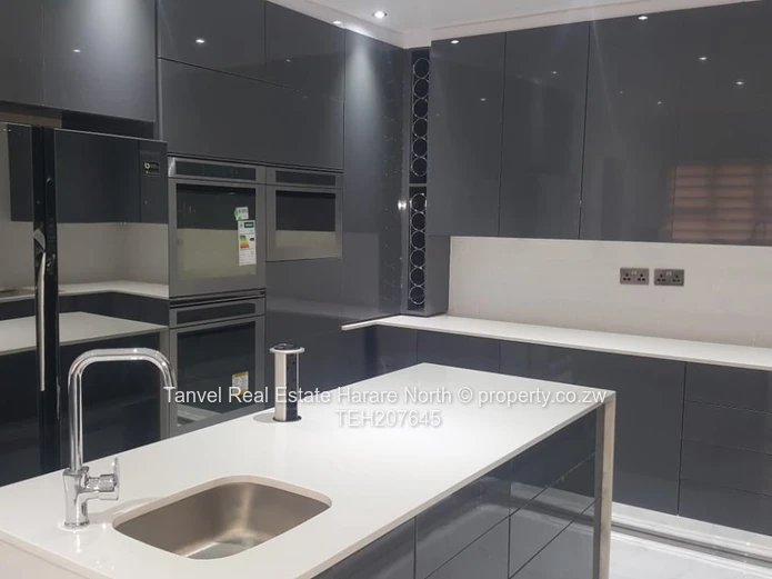 *Mt Pleasant House For Sale.*    An ultra modern double storey house located along Harare Drive 