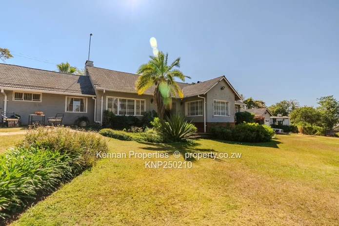 Attractive five bedroom home on two and a half acres. Good water and Msasa trees. (Sole Mandate)