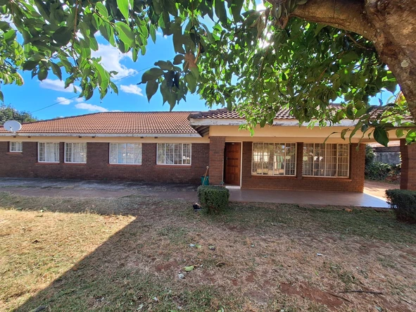  4-Bedroom Home with Extras – Great Potential, Secure Title.