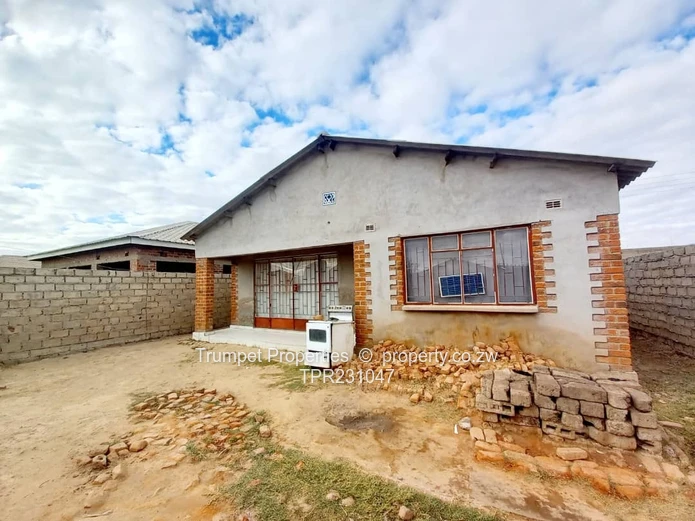4-Bed House with Tiled Verandah & Brick Detail in Murisa Park Chitungwiza