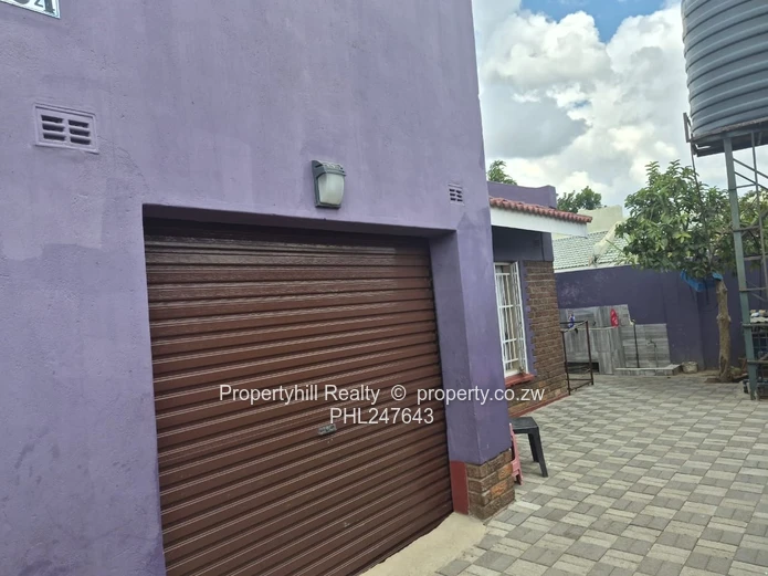 Secure 4-Bed Granary Park Home — Borehole, Garage & Paved Yard