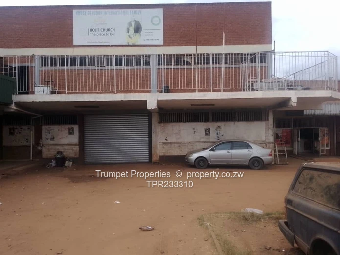 500m² Two-Storey Brick Retail Block with Yard – Warren Park (Sole Mandate)