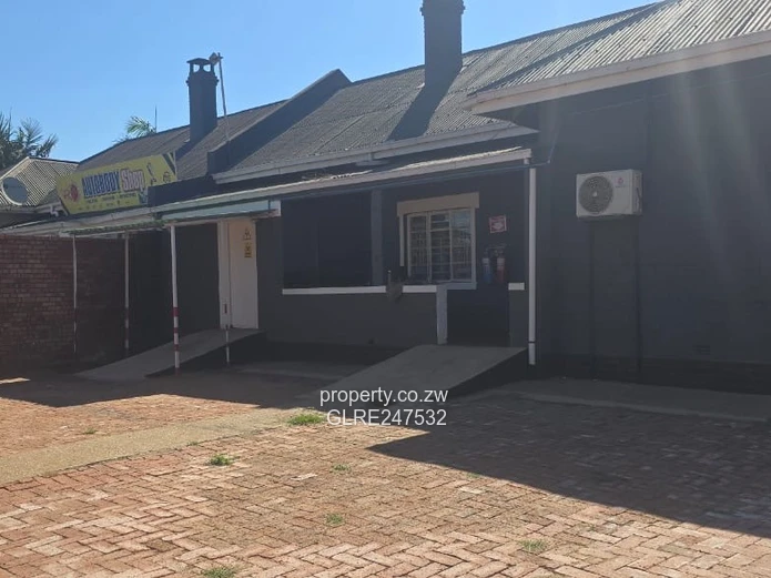 Harare CBD Office: Secure Walled Property with Paved Yard
