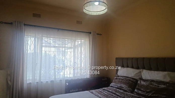 Avondale 2-Bed Garden Flat — Verandah & Borehole