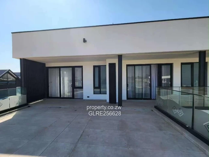 Borrowdale: Modern 4-Bed Apt w/ Glass Balconies & Borehole
