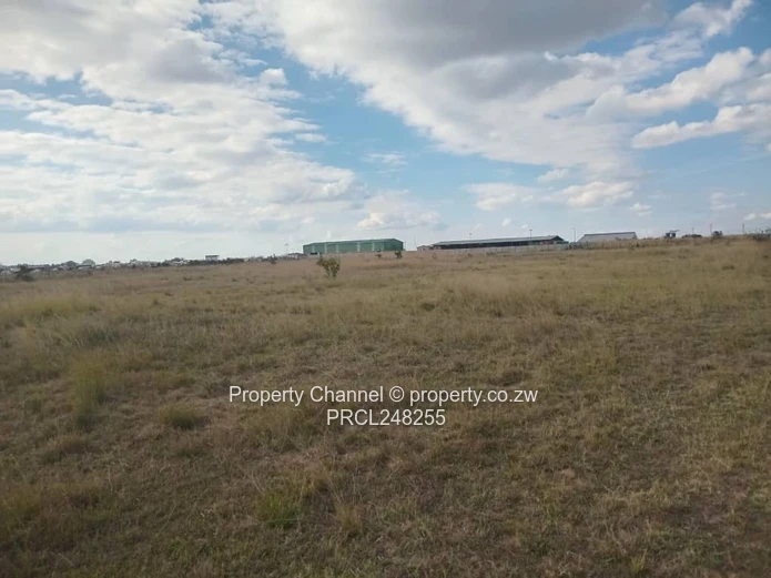 5,000 sqm Level Plot in 8km west of Gweru CBD — Open Grass, Adjacent Walled Property
