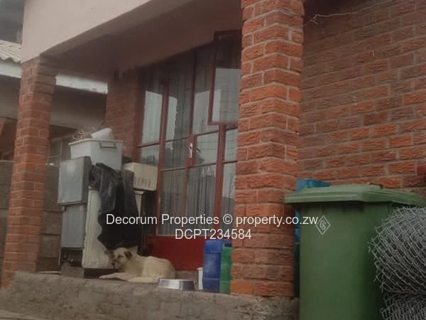 Brick-Front 4-Bed Walled Home in Ruwa — Tiled Floors