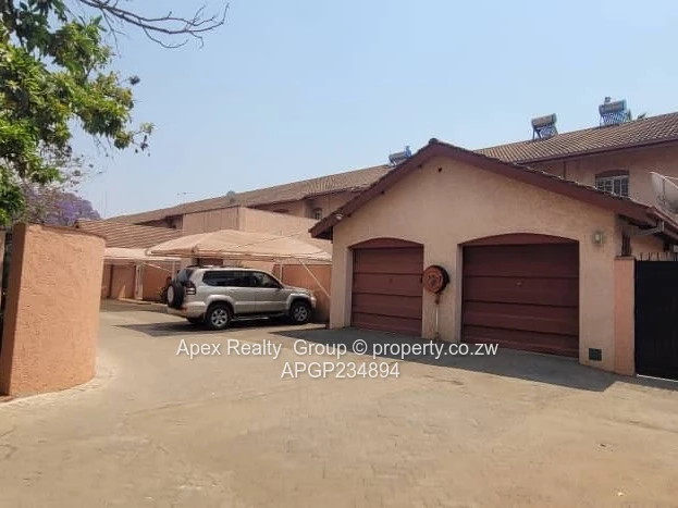 Baines & 3rd Avenue Garden Duplex For Sale