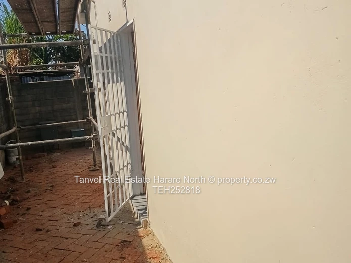Available for Sale in Warren Park D is a neatly refurbished house with 5 Bedrooms, Lounge and kitche
