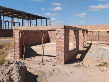 Incomplete shopping mall in Ruwa for sale