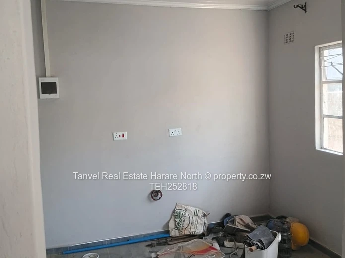Available for Sale in Warren Park D is a neatly refurbished house with 5 Bedrooms, Lounge and kitche