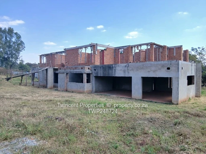 Incomplete 7 bedroomed house in Gletwin 