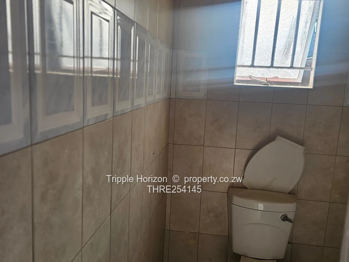 Chitungwiza unit O two houses for sale under one durawall 