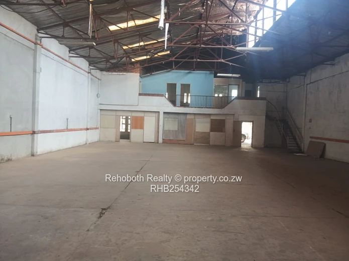 Graniteside Brick Warehouse 700m² on 3500m² — Borehole & Mezzanine