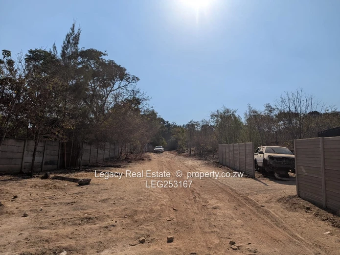 4472 m² Greystone Park — Sloping Stand with Cottage, Trees and Gate