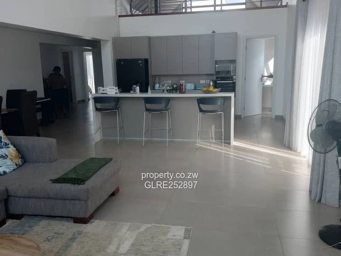 Bright High-Ceiling 4-Bed Home in Borrowdale (Borehole)
