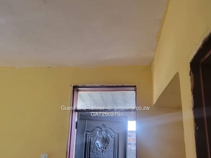 A neat 7-roomed, 4-bedroom house sitting on 200m², ideal for a family or as an investment property.