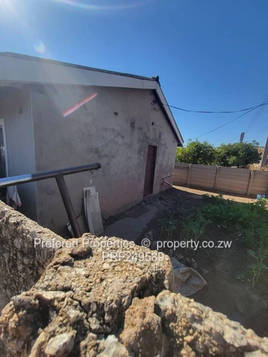 Walled 3-Bed Brick Home with Verandah in Kuwadzana