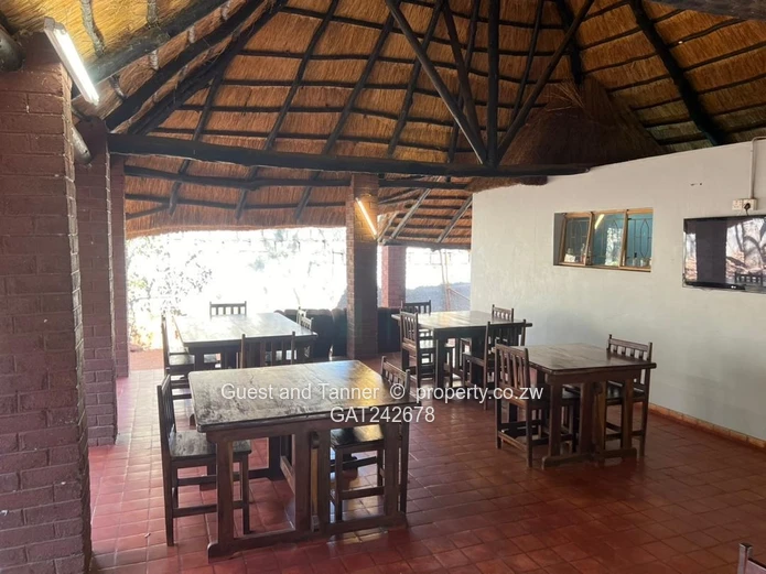 Ten bedroomed lodge under thatch for sale 