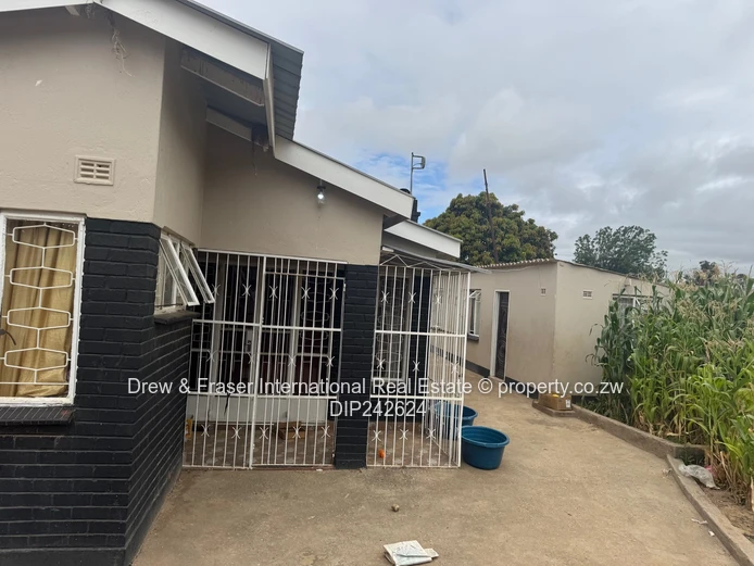 Unit L Seke 3 beds house with a cottage for sale