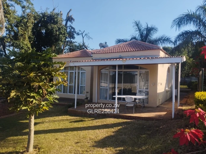 Palm-lined Borrowdale 5-Bed Home, 1,200m² & Borehole