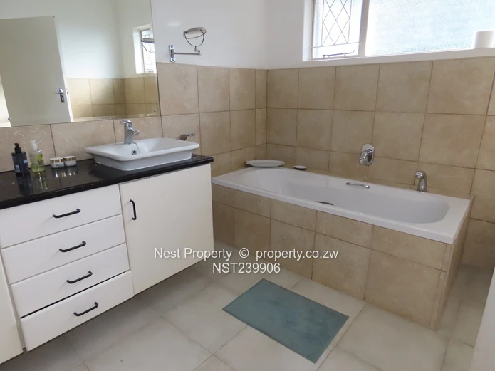 Neat, Embassy Style Home located in the heart of Gunhill!