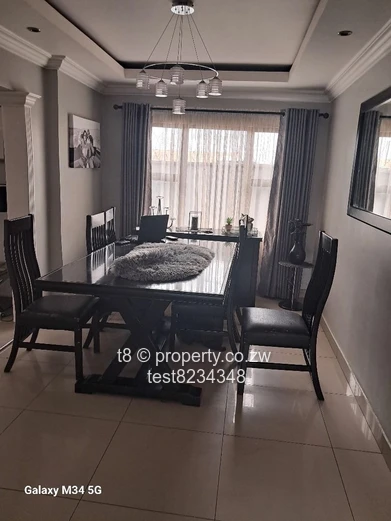 Spacious 4-Bed Home in Marimba Park — Garage & Fitted Kitchen