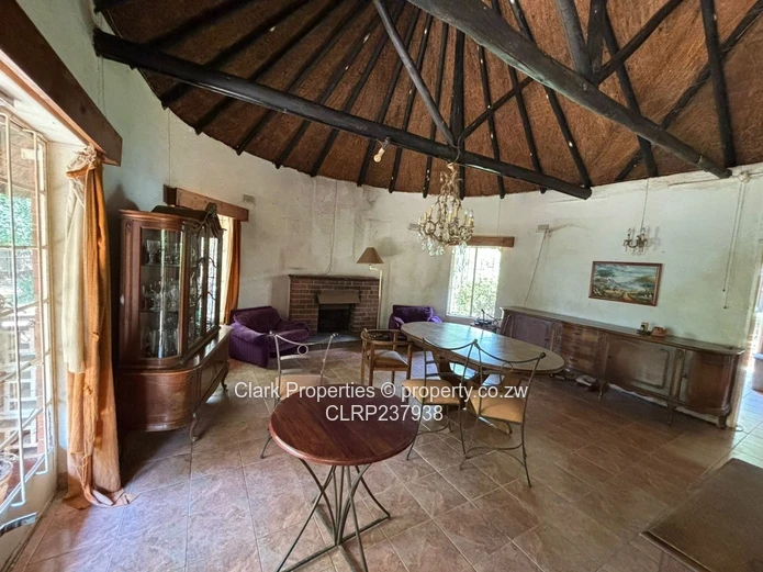 Spacious One-Acre Property with Unique Thatched Residence