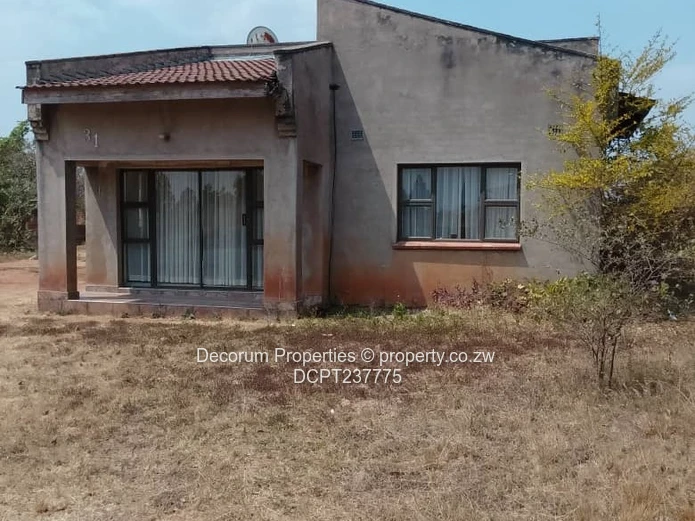 2 Bedroom cottage with unfinished main house for sale