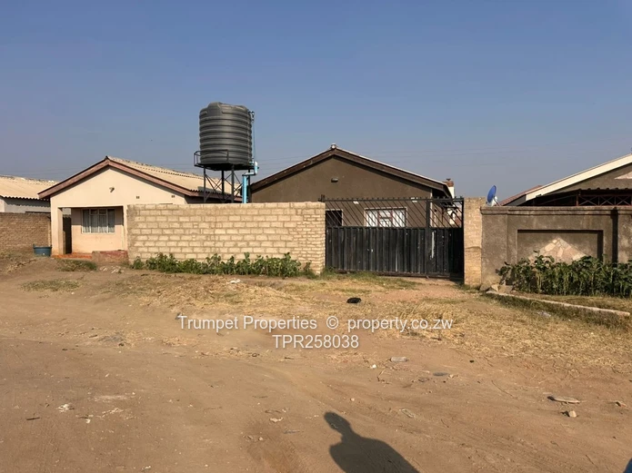 4-Bed Chitungwiza Home — Fitted Kitchen & Barred Windows