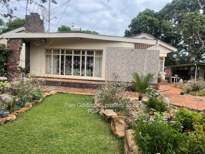 Charming, Compact Residence Set On Spacious Land