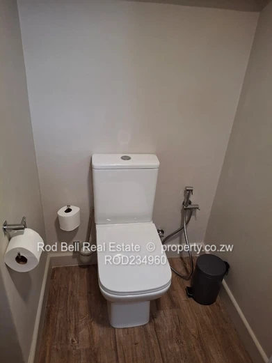 Chisipite 2-Bed Townhouse — Pool, Garden & Balcony