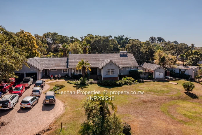 Attractive five bedroom home on two and a half acres. Good water and Msasa trees. (Sole Mandate)