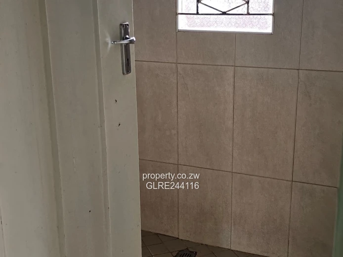 Tiled 2-Bed Kuwadzana Home — Borehole & Parking