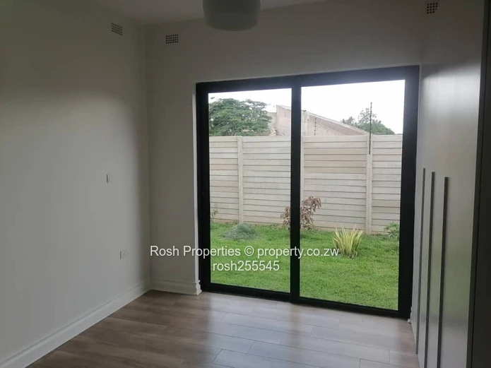 Modern 3-Bed Garden Flat in Borrowdale West with Borehole and Solar