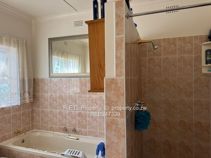 Secure, Comfortable Townhouse Living In Suburbs!