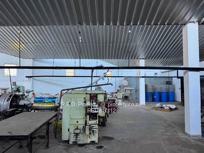 Large-Scale Commercial Property with Extensive Warehouse and Business Space In Belmont!