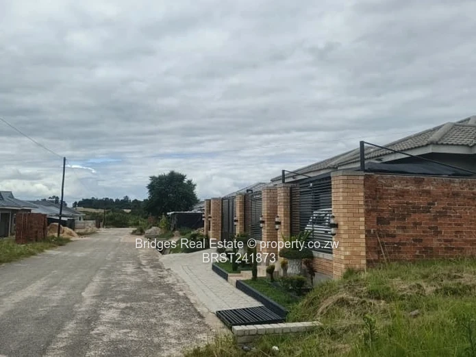 Serviced Residential Stand for Sale with Unfinished Structure