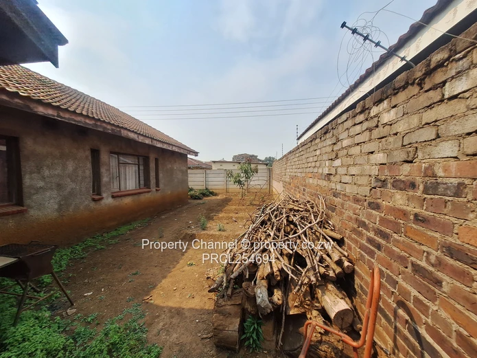 Solid 4-Bedroom Brick Home with Potential